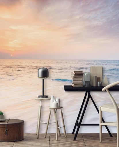 melkwitte golven en perzik zonsonderganghemel behang