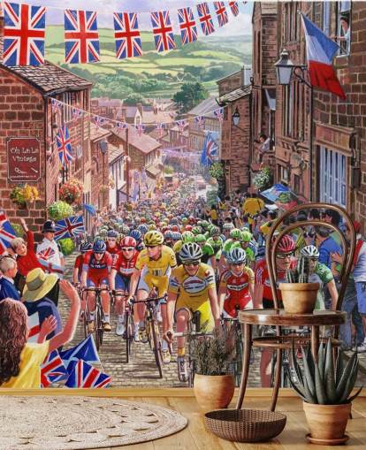 cyclists riding through old english town wallpaper