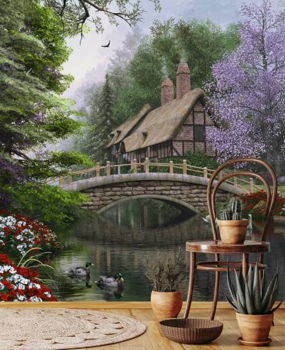 thatched cottage by a bridge and river wallpaper
