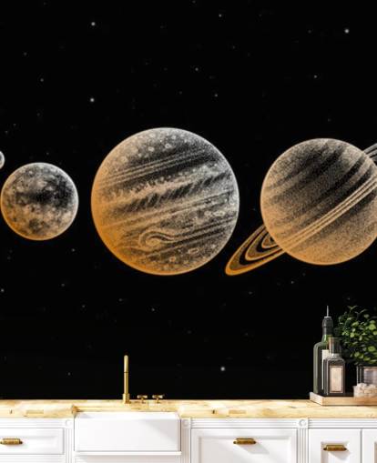 planetas en tonos dorados sobre fondo negro