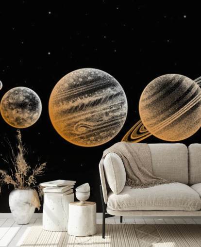 gold toned planets on black background wallpaper