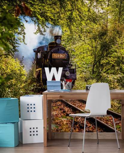 Dampfzug fährt durch Wald Tapete