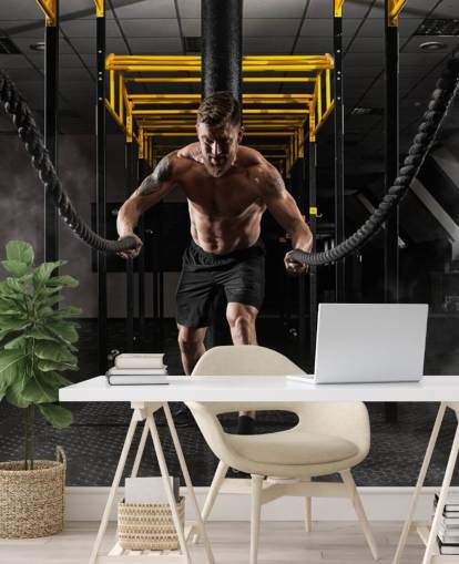fondo de pantalla oscuro de gimnasio con hombre con cuerdas pesadas