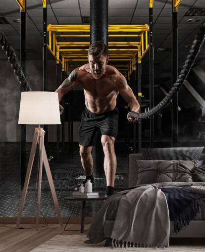 palestra scura con uomo con carta da parati con corde pesanti