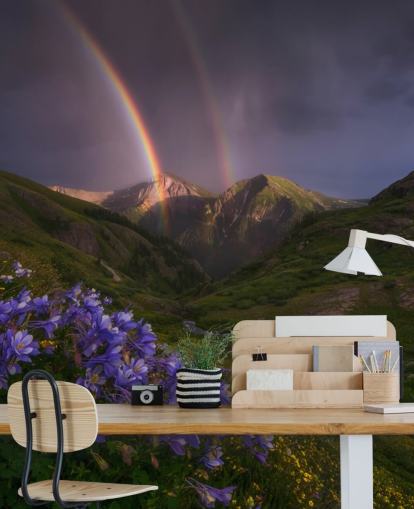 storm clouds and rainbow over mountain fields wallpaper