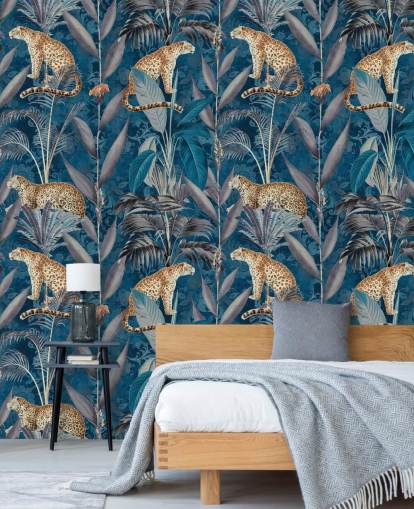 fond d'écran de répétition de motif sur les guépards sur fond bleu tropical papier peint