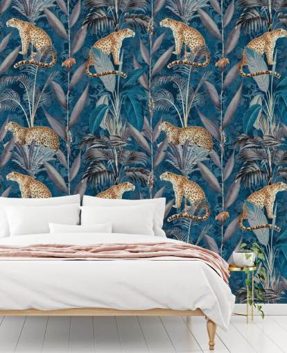 papel tapiz de repetición de patrón en guepardos en papel tapiz de fondo azul tropical