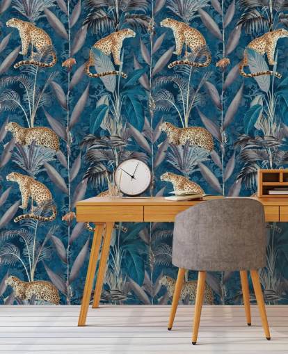 papel tapiz de repetición de patrón en guepardos en papel tapiz de fondo azul tropical