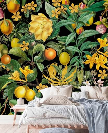 fruta amarilla y naranja sobre fondo negro