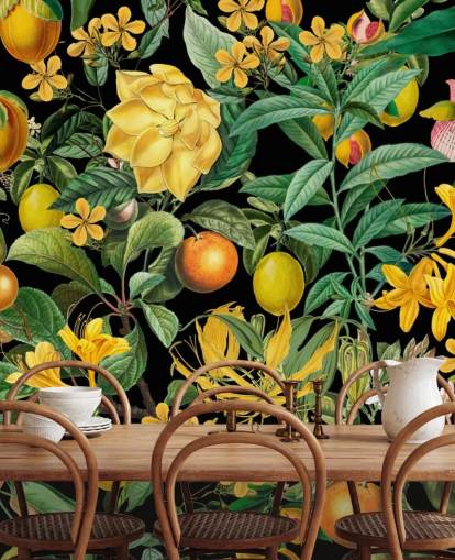 fruta amarilla y naranja sobre fondo negro