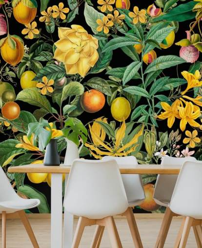 fruta amarilla y naranja sobre fondo negro