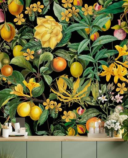 fruta amarilla y naranja sobre fondo negro