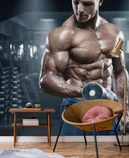 culturista masculino haciendo pesas en el fondo de pantalla de gimnasio