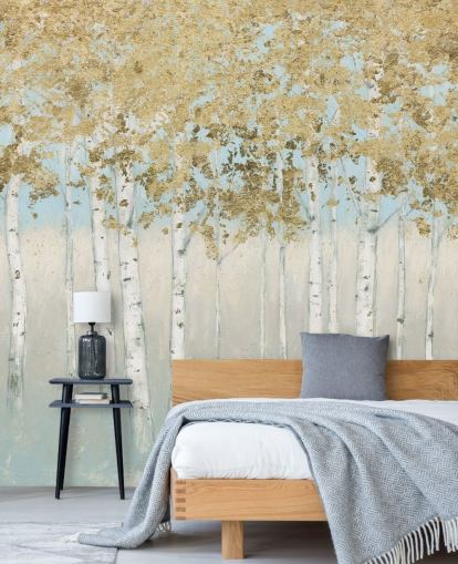 papier peint bouleaux aux feuilles dorées et ciel rose clair