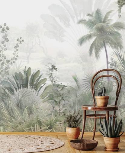 Muted green jungle landscape wallpaper with tall plam trees and a hazy background
