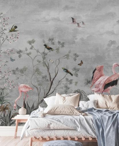 Grey cloudy background with branches and pink flowers and flamingo birds