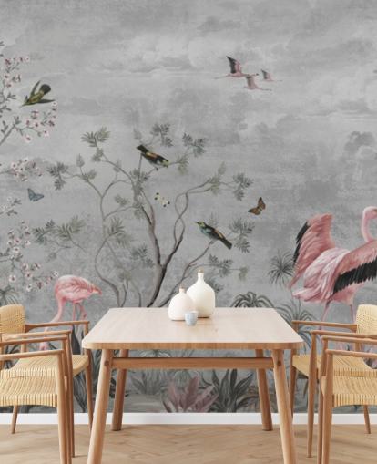 Gray cloudy background with branches and pink flowers and flamingo birds
