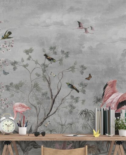 Fundo cinza nublado com galhos e flores cor de rosa e pássaros flamingos