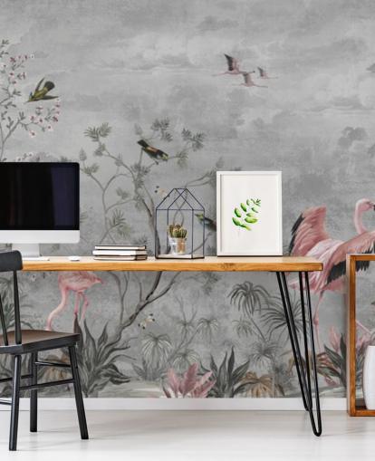 Grijze bewolkte achtergrond met takken en roze bloemen en flamingovogels