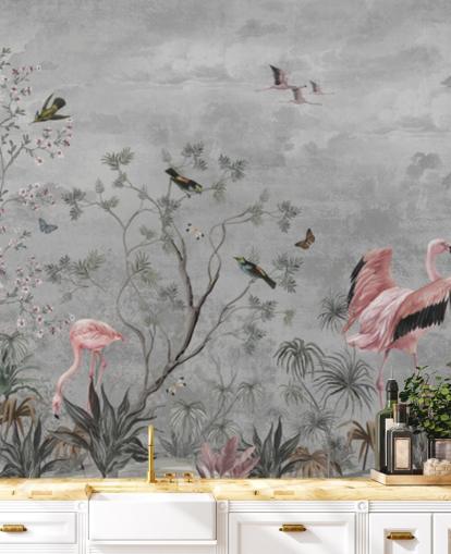 Grå molnig bakgrund med grenar och rosa blommor och flamingo fåglar