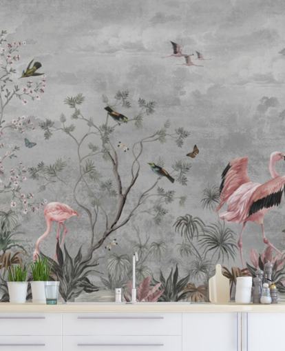 Harmaa pilvinen tausta oksilla ja vaaleanpunaisilla kukilla ja flamingo-linnuilla