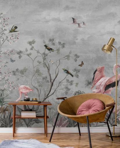 Grå skyet bakgrunn med grener og rosa blomster og flamingofugler Grå skyet bakgrunn med grener og rosa blomster og flamingofugler