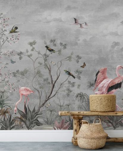 Gray cloudy background with branches and pink flowers and flamingo birds