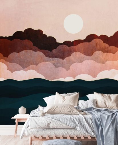 Pink and maroon clouds in a pink sky with a dark blue sea wall mural