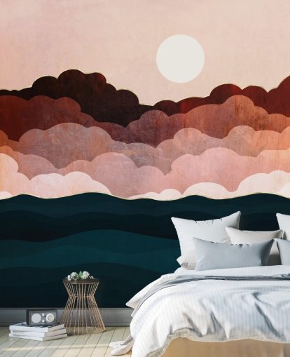 Pink and maroon clouds in a pink sky with a dark blue sea wall mural Pink and maroon clouds in a pink sky with a dark blue sea wall mural