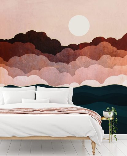 Rosa och rödbruna moln i en rosa himmel med en mörkblå havsväggmålning