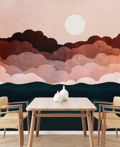 Pink and maroon clouds in a pink sky with a dark blue sea wall mural
