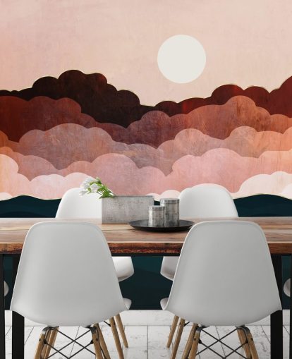 Nubes rosadas y granates en un cielo rosa con un mural marino azul oscuro