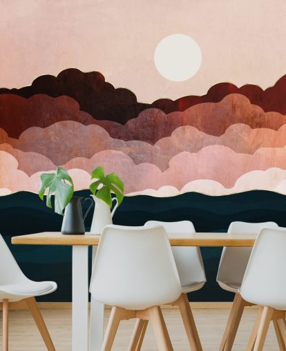 Nubes rosadas y granates en un cielo rosa con un mural marino azul oscuro