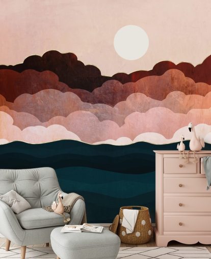Pink and maroon clouds in a pink sky with a dark blue sea wall mural