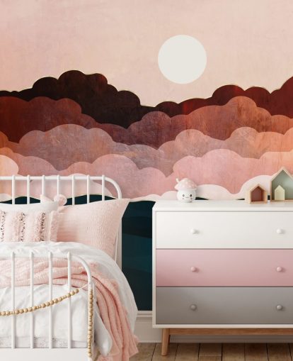 Pink and maroon clouds in a pink sky with a dark blue sea wall mural Pink and maroon clouds in a pink sky with a dark blue sea wall mural