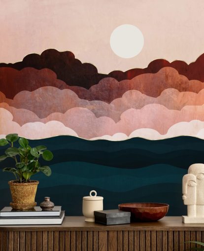 Nuvens rosa e marrom em um céu rosa com um mural de parede de mar azul escuro