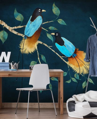 Blue and gold birds on a branch with green leaves on a dark blue background Blue and gold birds on a branch with green leaves on a dark blue background