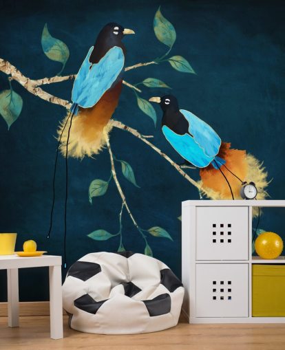 Blue and gold birds on a branch with green leaves on a dark blue background Blue and gold birds on a branch with green leaves on a dark blue background