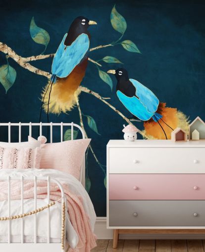 Blue and gold birds on a branch with green leaves on a dark blue background Blue and gold birds on a branch with green leaves on a dark blue background