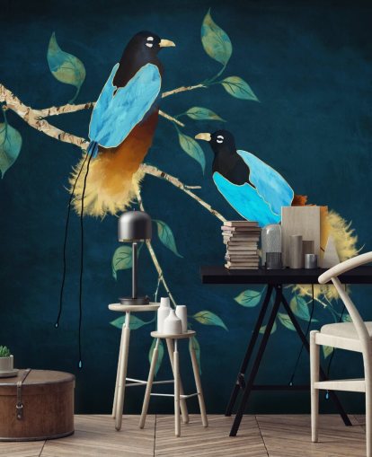Blue and gold birds on a branch with green leaves on a dark blue background Blue and gold birds on a branch with green leaves on a dark blue background