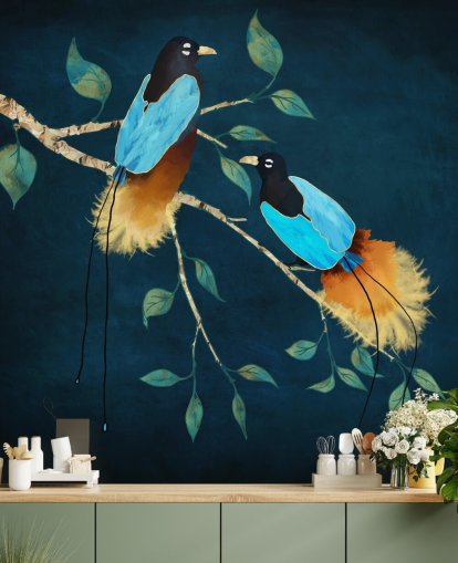 Blue and gold birds on a branch with green leaves on a dark blue background