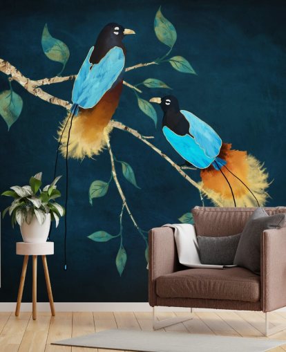 Blue and gold birds on a branch with green leaves on a dark blue background