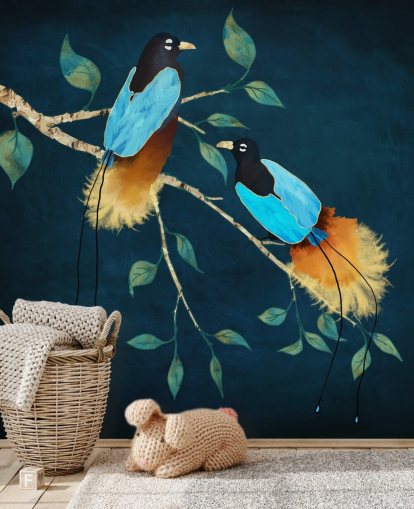 Blue and gold birds on a branch with green leaves on a dark blue background Blue and gold birds on a branch with green leaves on a dark blue background