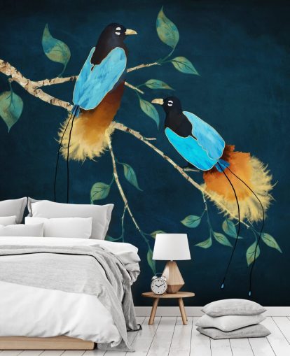 Blue and gold birds on a branch with green leaves on a dark blue background