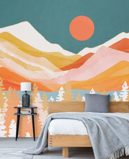 Montagne e foreste arancioni e gialle con un cielo verde acqua e un sole arancione