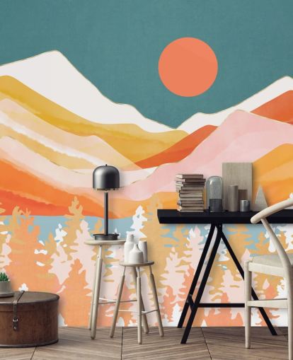 Orange and yellow mountains and forest with a teal sky and orange sun