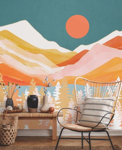 Orange and yellow mountains and forest with a teal sky and orange sun wall mural