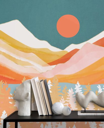 Orange and yellow mountains and forest with a teal sky and orange sun