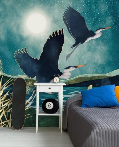 Navy herons flying over a blue river with a turquiose sky