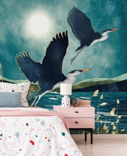 Navy herons flying over a blue river with a turquiose sky